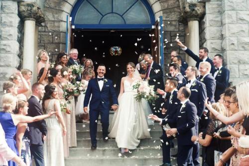 bride groom exiting with confetti
